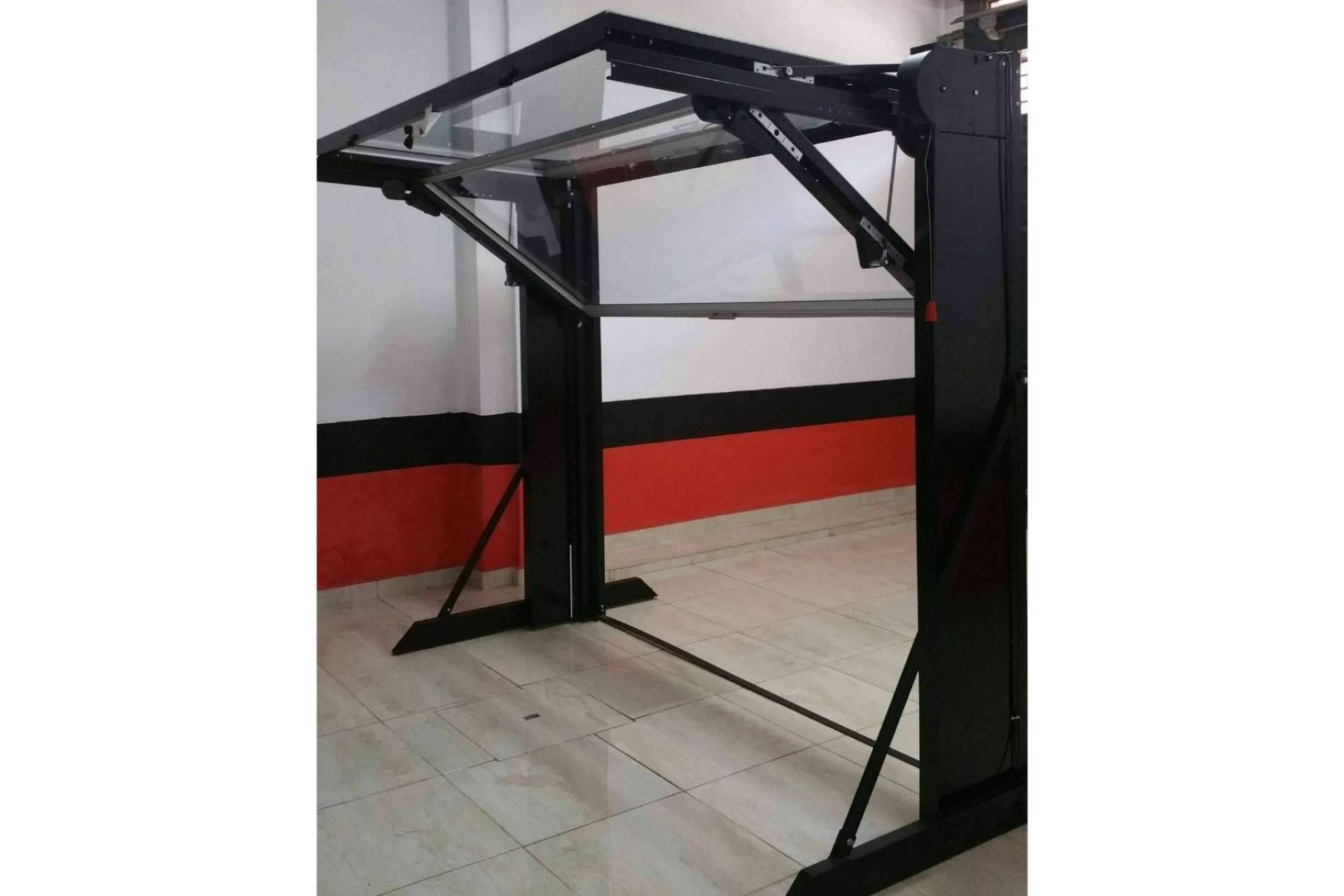 Puertas de garaje adaptadas a los clientes que combinan seguridad y tecnología, de la mano de Overlap