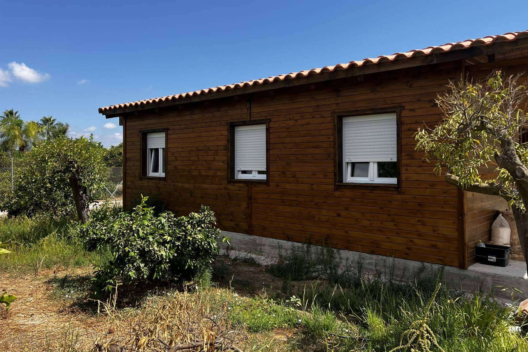 Encontrar una casa de madera prefabricada con Delmader